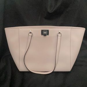 Michael Kira’s shoulder Bag Soft Pink new never used. No tag.